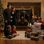 Parents made my kids watch their cousin open a large pile of Christmas gifts while the family gathered around the tree