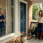 Daughter-in-law at my front door with three large suitcases while Sophia watches from inside her home
