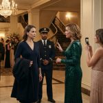 Woman confronted by her stepmother and a security guard during an elegant hotel gala while her father watches from the background.
