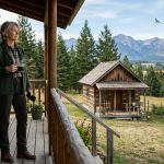 Retired woman standing outside her Montana cabin after learning her daughter-in-law plans to move her parents onto the property.