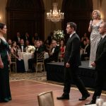 Laura stands alone at dad's lavish retirement party as her stepmother gestures toward security and her father looks down in silence.