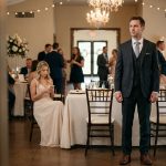 Groom looking toward the empty entrance after his parents skipped his wedding