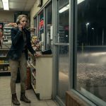 Teenage girl in riding boots calling her aunt from a truck stop during a tense late-night family crisis.