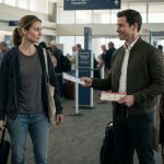 Career military officer Emily holding an economy boarding pass while her brother displays his first-class ticket at the airport.