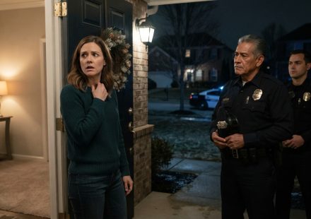 Molly opens her front door to two police officers after her husband and son fail to return from their fishing trip.