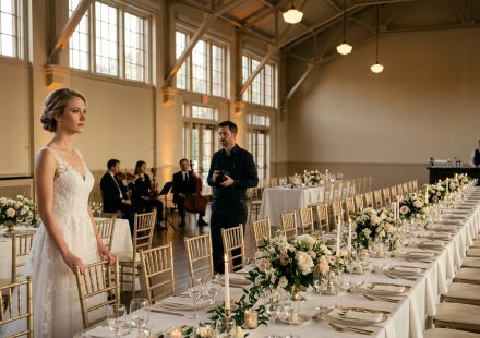 A disappointed bride stands inside an elegant wedding banquet hall surrounded by empty guest chairs after her brother hijacked her wedding date.