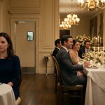 A quietly disappointed woman seated alone at the back table during her brother's elegant engagement dinner while the family celebrates.