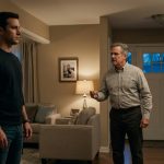 A 32-year-old homeowner standing firmly inside a suburban Ohio house while their father confronts them about giving the property to a younger brother.