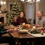 Anna looks hurt at a family dinner as her sister Heather raises a wineglass and demands that Anna babysit four children during Christmas.